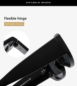 Detail view of flexible hinges and glossy black frame of the square cat eye sunglasses