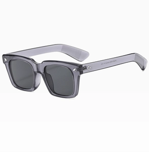 Detail of square gray translucent sunglasses frame showing ZN13818 size parameters