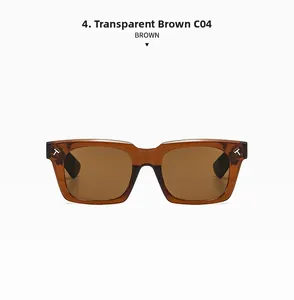 Detail of square frame sunglasses in transparent brown with gold T-shaped metal hinges