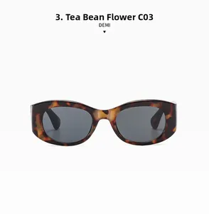 Front view of vintage tortoiseshell cat-eye sunglasses with dark grey lenses and wide temples