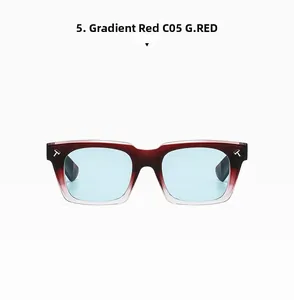 Detail of square gradient red frame with blue tinted lenses and T-shaped metal logo