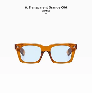 Detail of square transparent orange sunglasses with T-shaped metal hinge and blue lenses