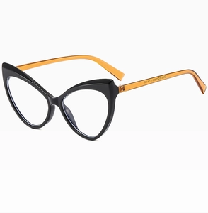 Detail view of Y2K cat-eye glasses frame in glossy black with amber orange temples