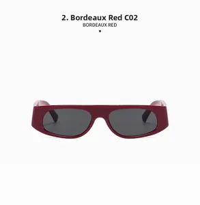 Detail view of Bordeaux red rectangular sunglasses with a glossy finish and dark lenses