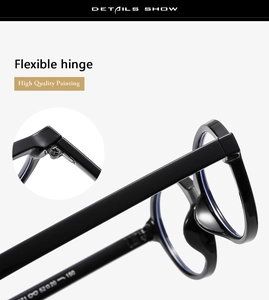 Detail view of high quality flexible hinge on black full-rim glasses frame with macro focus