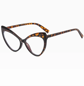 Detailed side view of retro cat-eye glasses frame with leopard tortoiseshell texture