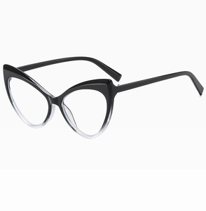 Detail of vintage cat-eye glasses frame with black and transparent splicing design
