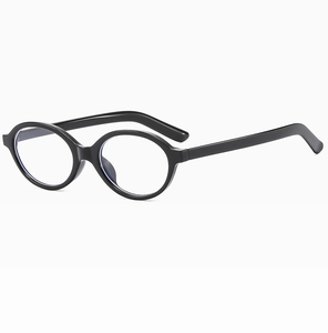 Flat lay of vintage black oval eyeglass frames with clear anti-blue light lenses