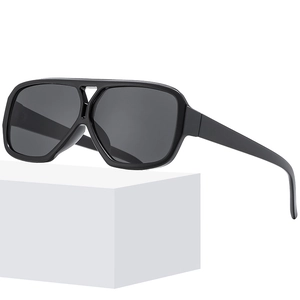 Classic double-bridge square pilot sunglasses with thick black frames and dark lenses