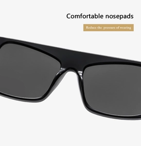 Detailed view of comfortable integrated nose pads on large black frame sunglasses