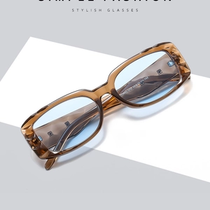 Retro square sunglasses with amber tortoiseshell frames and light blue tinted lenses