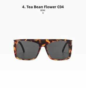 Detail of square flat top sunglasses in demi frame with dark grey sun lenses