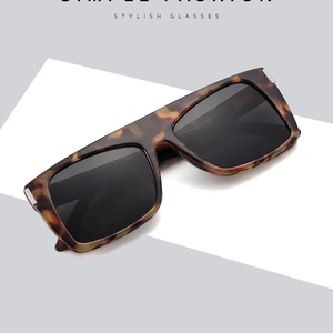 Flat top tortoiseshell sunglasses with dark grey lenses and retro square frames