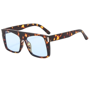 Vintage oversized sunglasses with tortoiseshell frames and light blue transparent lenses