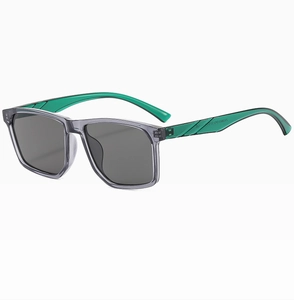 Detail view of grey square frame sunglasses with vibrant green temples and model text