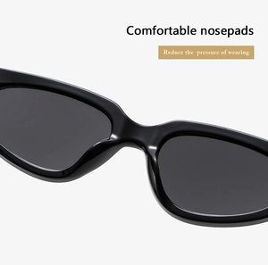 Detail of comfortable integrated nose pads on black cat-eye sunglasses for pressure reduction