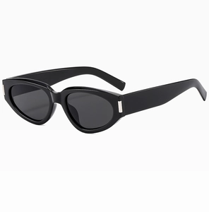 Detailed view of black oval cat-eye sunglasses with silver metal temple accents