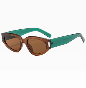 Detail of oval cat-eye sunglasses featuring translucent brown and teal contrast temples