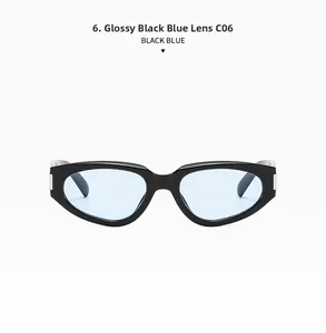 Detailed close-up of glossy black cat-eye frame sunglasses with light blue lenses