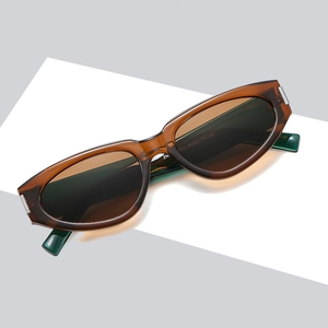Modern cat-eye sunglasses with translucent tea frames and dark brown lenses