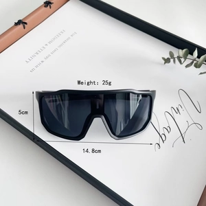 Detailed size view of kids oversized black sports sunglasses weighing only 25g
