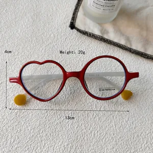 Kids' novelty glasses with heart and round red frames, featuring anti-blue light protection