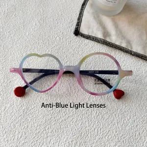 Detailed view of asymmetric kids' rainbow glasses with heart and round frames weighing 20g