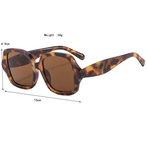 Lunettes de soleil carrées vintage oversize avec monture écaille et verres marron chic