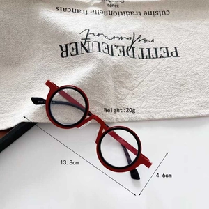 Detail shot of red steampunk round glasses showing size dimensions and lightweight 20g frame