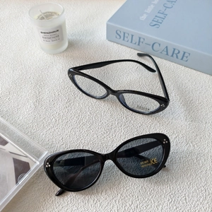 Lunettes de soleil rétro œil de chat pour enfants avec monture noire et UV400