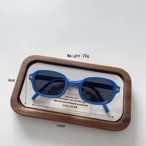 Detailed view of blue foldable kids sunglasses with dimensions 14cm width and 4cm height