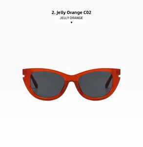 Detail view of jelly orange cat-eye sunglasses frames and gray lenses with C02 code