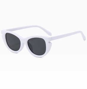 Detail view of white retro cat eye sunglasses with dark lenses and sturdy hinges