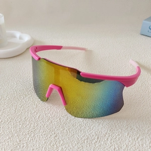 Close-up of pink sports sunglasses with colorful gradient lenses and non-slip temple tips