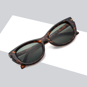Retro tortoiseshell sunglasses with black polarized lenses shown at a balanced angle
