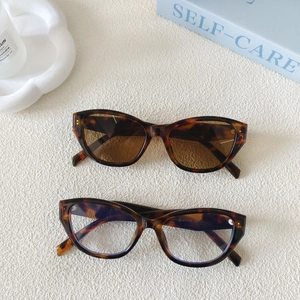 Retro cat-eye tortoiseshell sunglasses and clear optical frames with UV protection