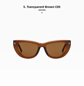 Detail view of transparent brown cat eye sunglasses in C05 style with metal studs