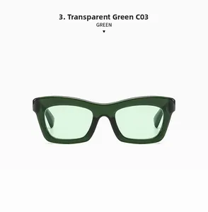 Détail de lunettes de soleil œil de chat vert transparent avec monture rétro et verres teintés