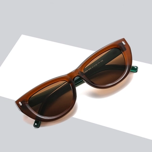 Elegant tortoiseshell cat eye sunglasses with brown lenses and metal hardware accents