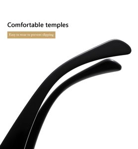 Close-up of ergonomic black glossy temples on oval sunglasses for a comfortable fit