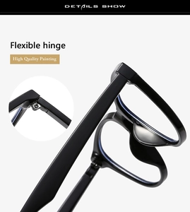 Detail view of the flexible hinge and high-quality painting on black cat-eye eyeglass frames