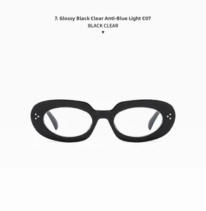 Close-up of black oval anti-blue light glasses with metallic decorative rivets and clear lenses