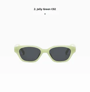 Detail view of the jelly green translucent cat eye sunglasses frame with dark lenses