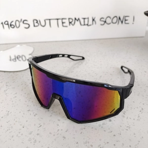 Detail of colorful gradient mirrored lenses and black frame on kids sports sunglasses