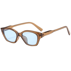 Retro cat-eye sunglasses with brown translucent frames and light blue flat lenses