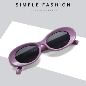 Vintage purple oval sunglasses with dark lenses and minimalist thick frames for fashion