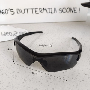 Front view of black sports sunglasses for kids with streamlined frame and dark lenses