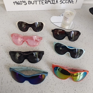 Kids foldable sunglasses in various colors with portable design and UV protection