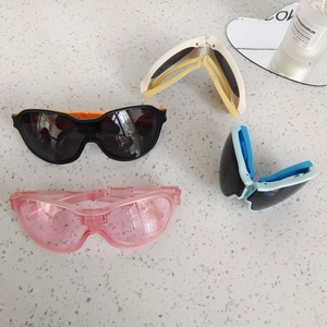 Foldable children's sunglasses set with UV protection in four assorted stylish colors