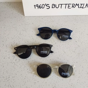 Lunettes de soleil polarisées rondes pour enfants avec monture rétro transparente